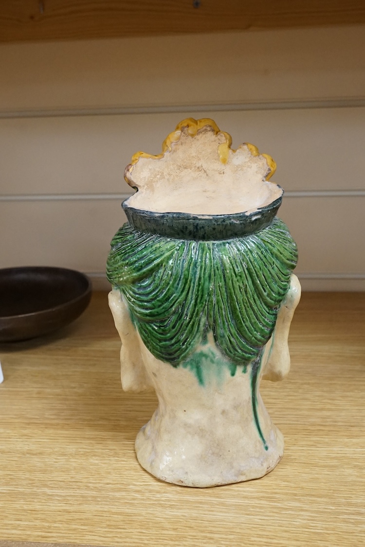 A Chinese Sancai glazed bust of a Bodhisattva, 23cm high